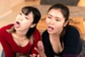 On their knees holding spent cock tongues out cum in mouth
